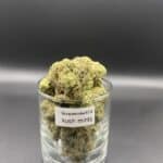 Kush Mint cannabis flower buds with a hand-trimmed finish and structured appearance.