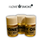 Honey Oil 2g cannabis concentrate with golden colour and thick texture